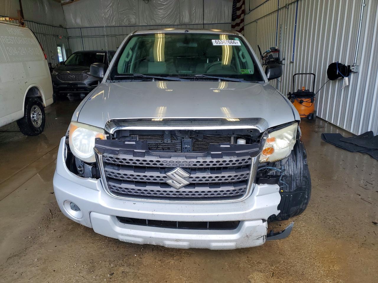 5Z61D0ER0CC420460 · 2012 SUZUKI EQUATOR · 5/12