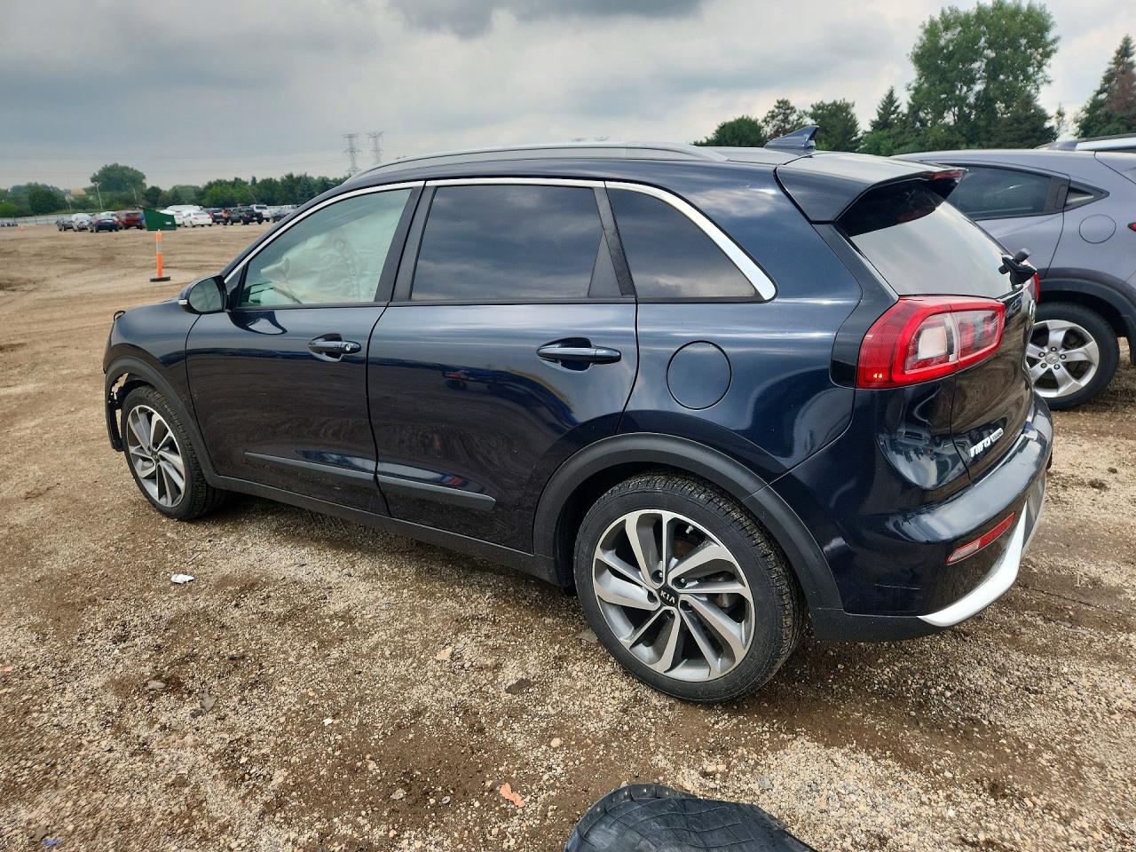 KNDCE3LC7H5047742 · 2017 KIA NIRO · 2/13