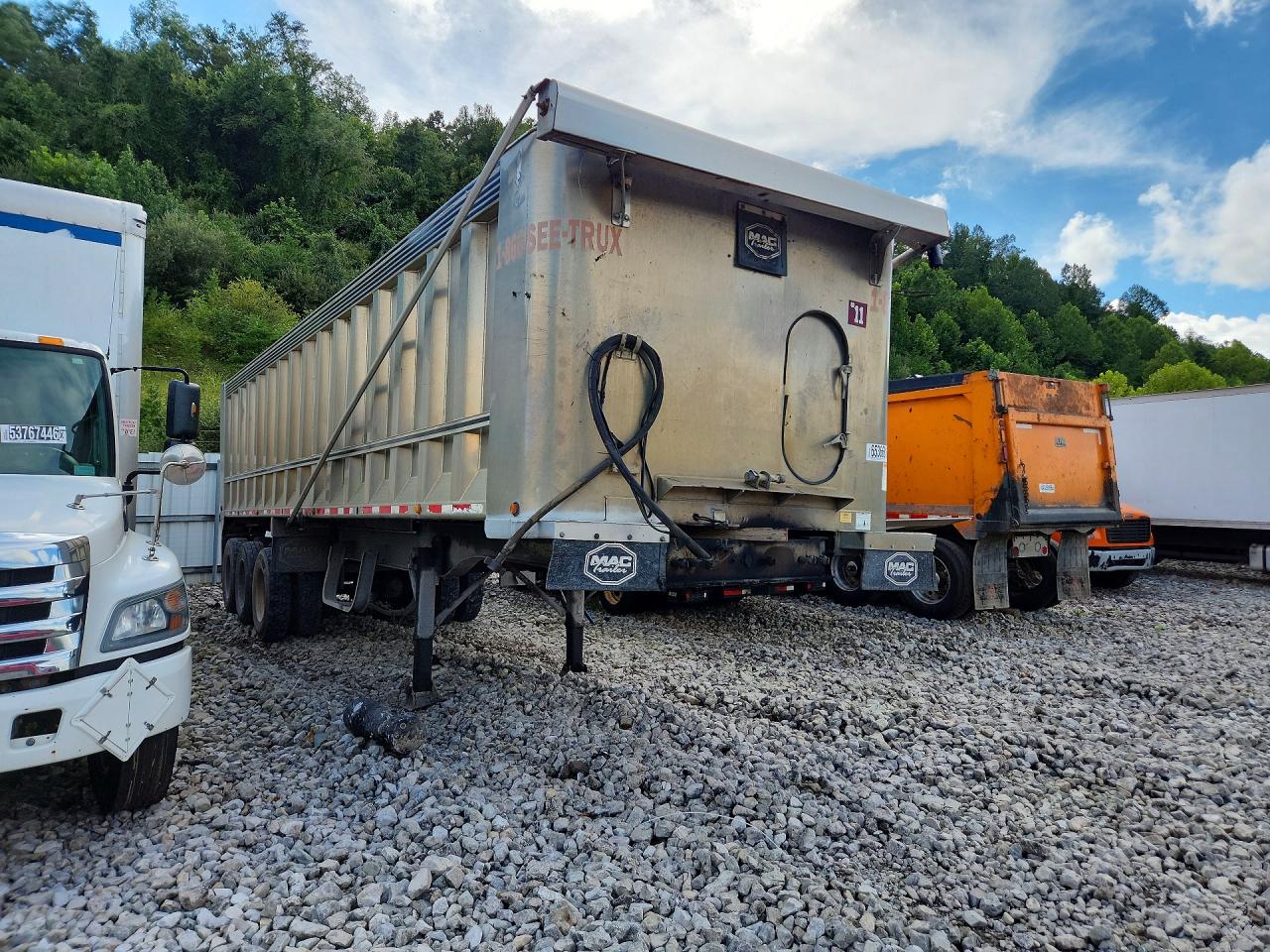 5MADS3532CC021489 · 2012 MAC TRAILER MFG DUMP TRAIL · 4/11