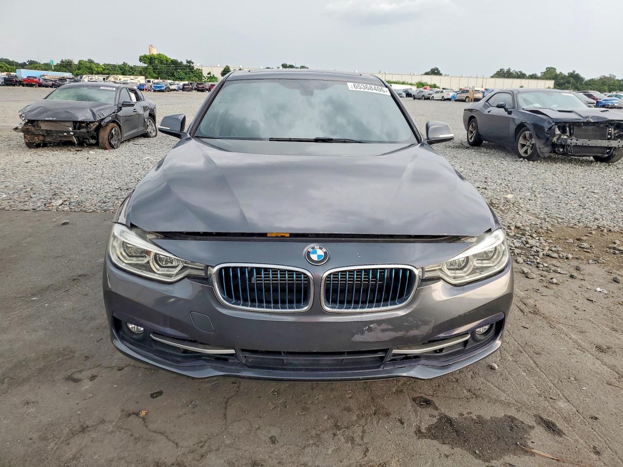 WBA8E1C52JA178602 · 2018 BMW 330E · 5/12