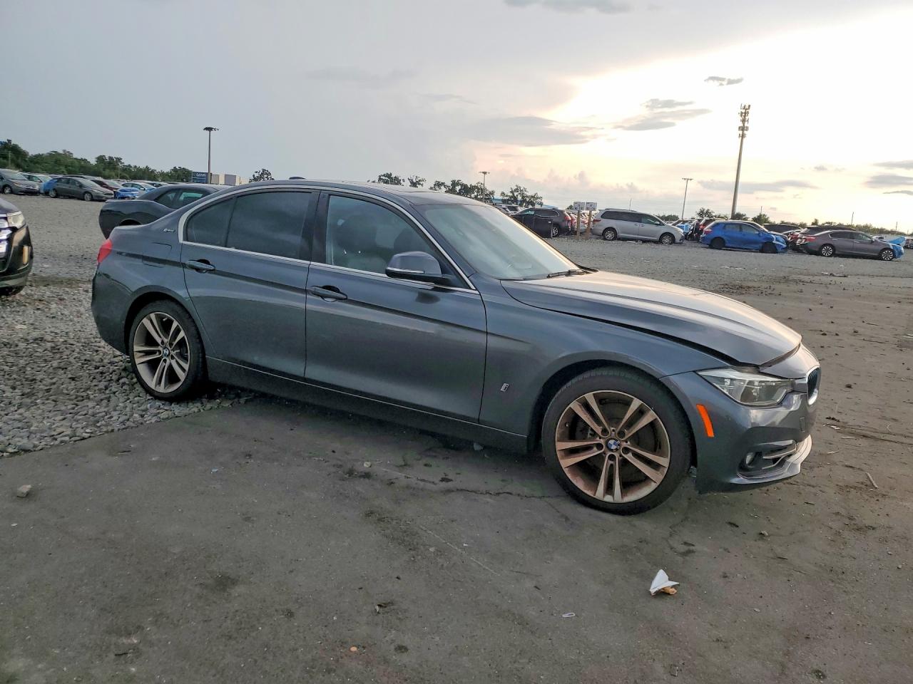 WBA8E1C52JA178602 · 2018 BMW 330E · 4/12