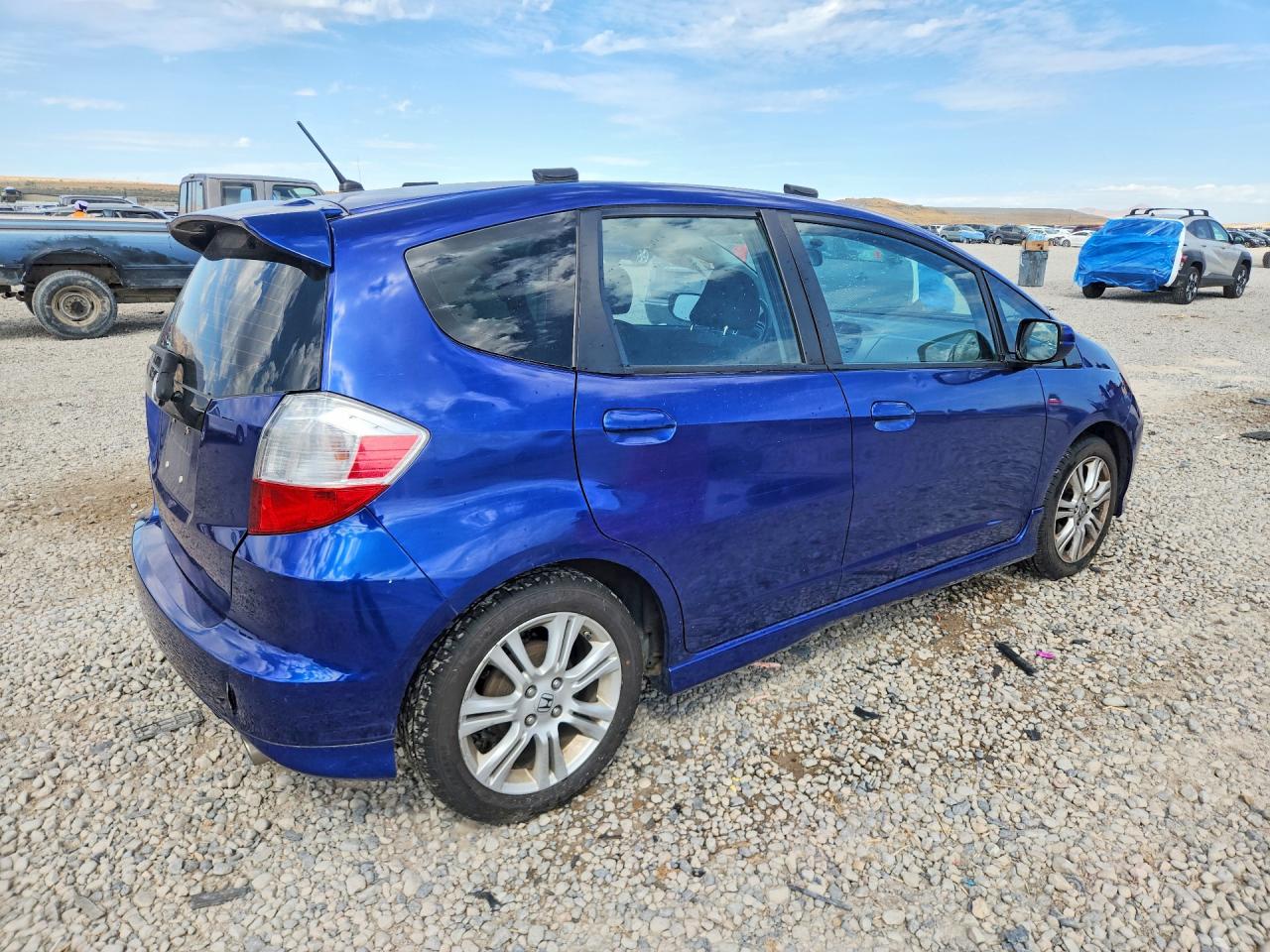 JHMGE8H41AS005301 · 2010 HONDA FIT · 3/12