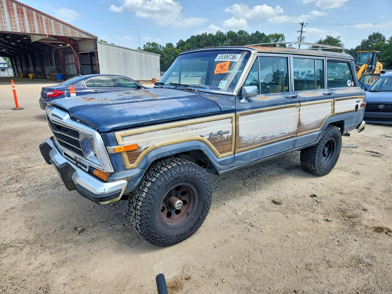 1J4GS5871KP111278 · 1989 JEEP GRAND WAGONEER