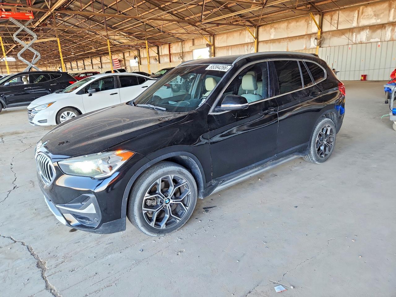 WBXJG7C02M5S30154 · 2021 BMW X1