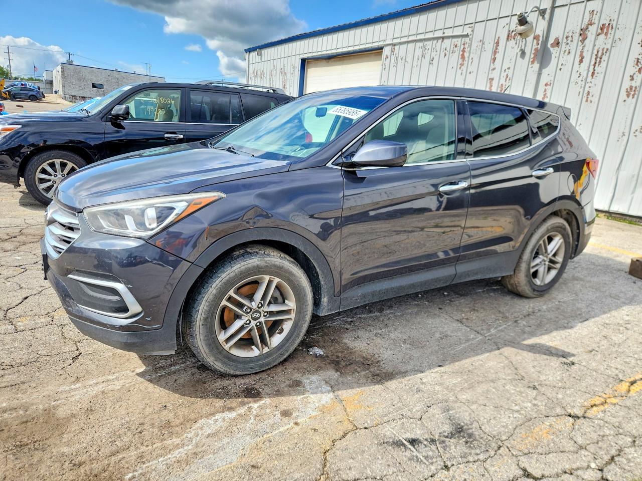 5XYZT3LB4JG565523 · 2018 HYUNDAI SANTA FE SPORT