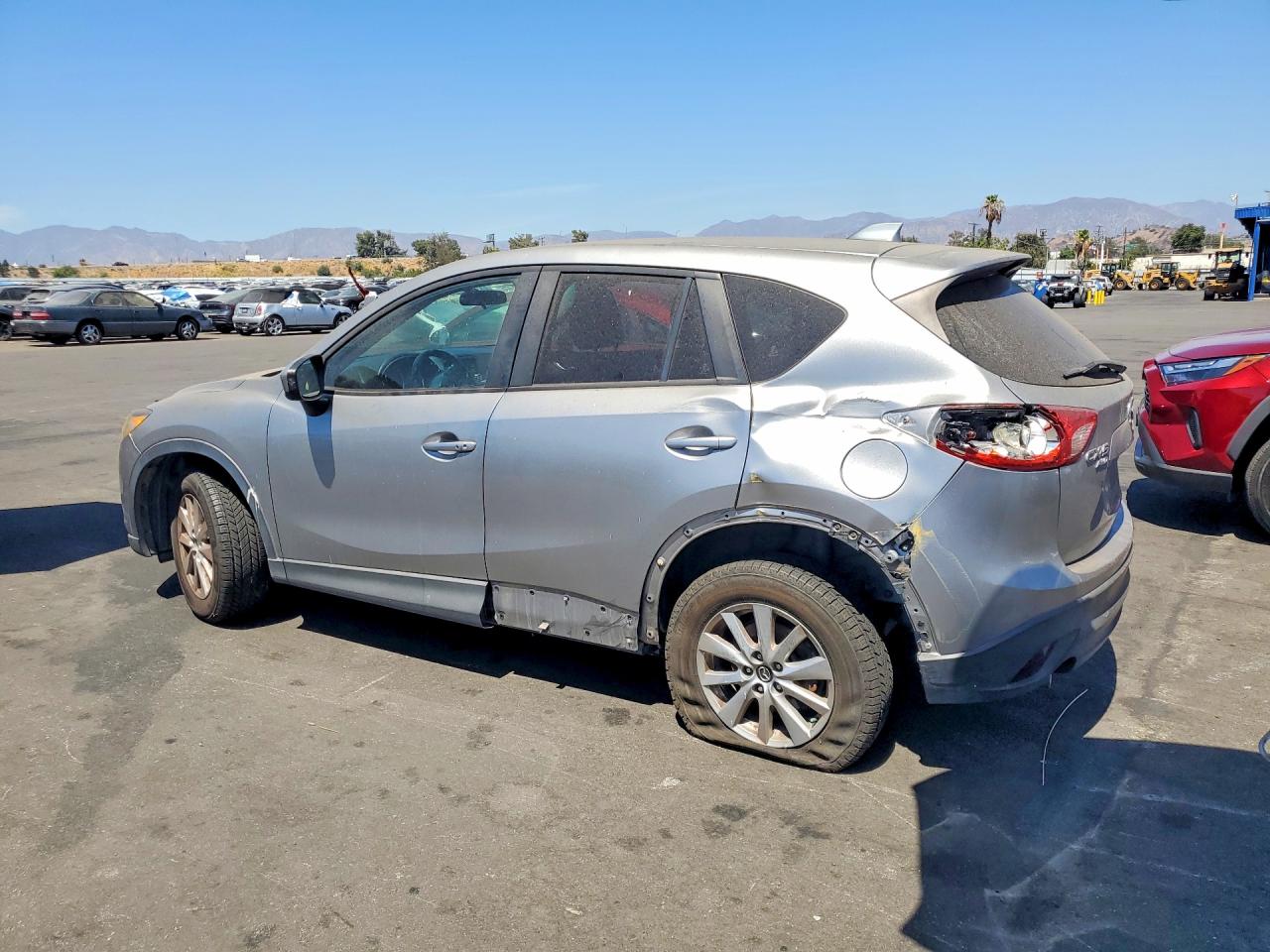 JM3KE4CY0F0443042 · 2015 MAZDA CX-5 · 2/12
