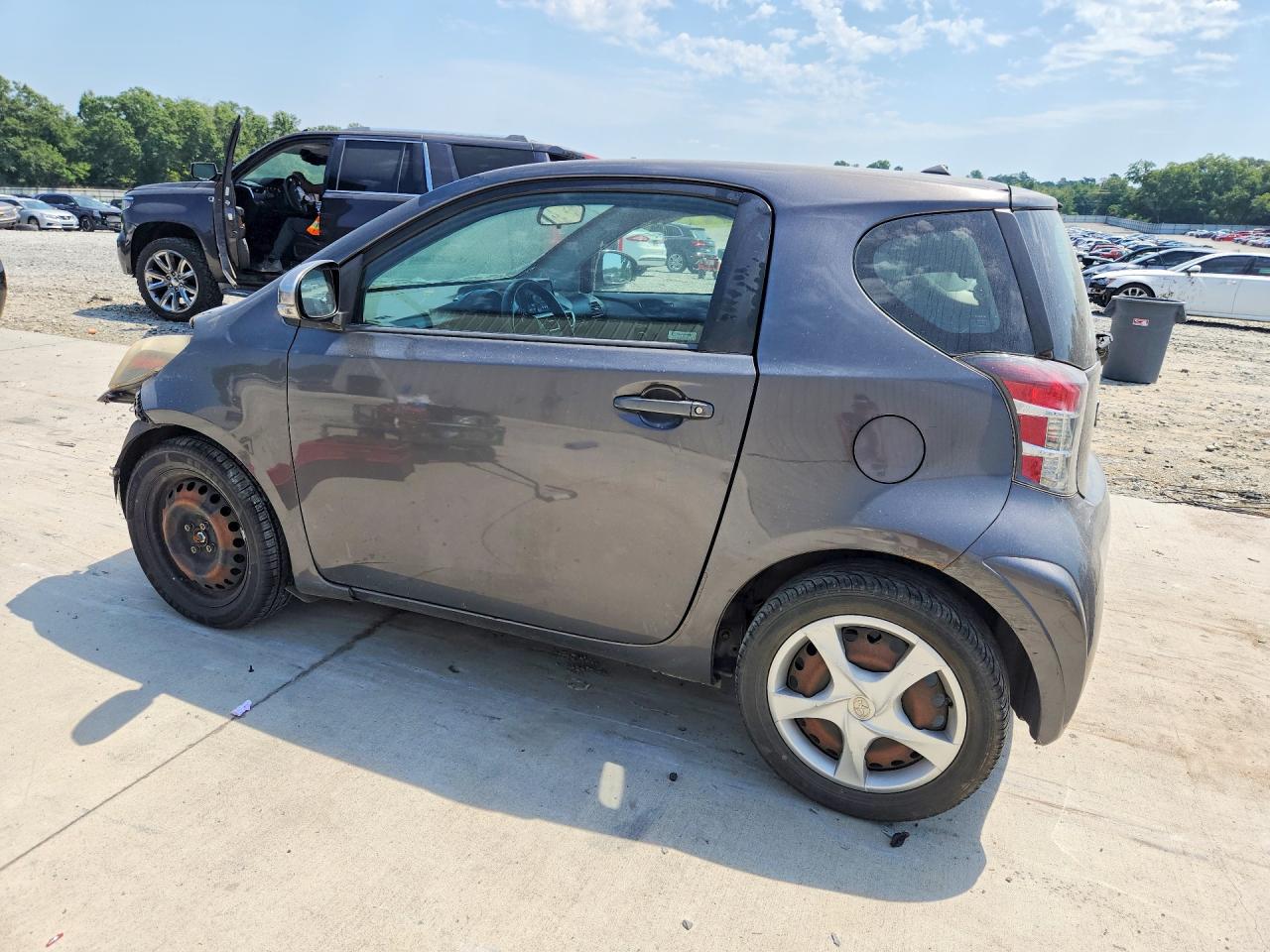 JTNJJXB06CJ009318 · 2012 SCION IQ · 2/12
