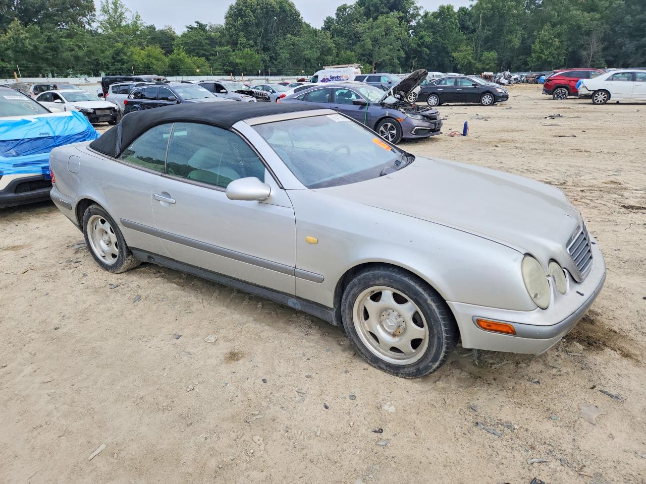 WDBLK65G4XT026480 · 1999 MERCEDES-BENZ CLK · 4/13