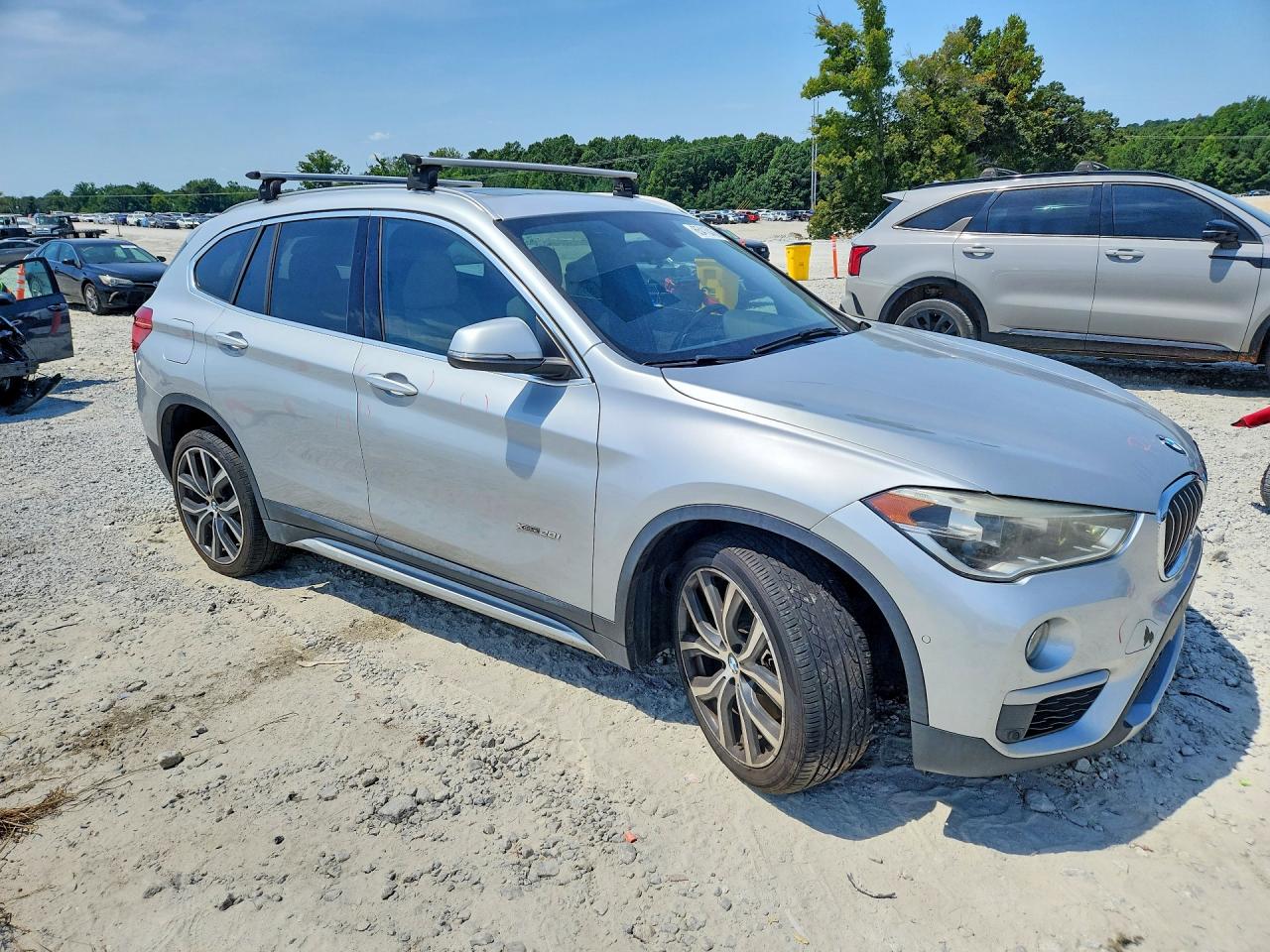 WBXHT3C37H5F71202 · 2017 BMW X1 · 4/13