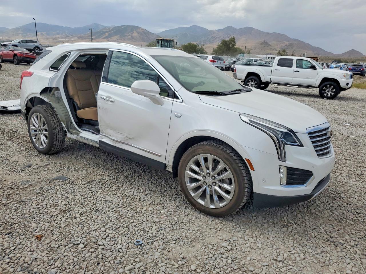1GYKNGRS2KZ115571 · 2019 CADILLAC XT5 · 4/13