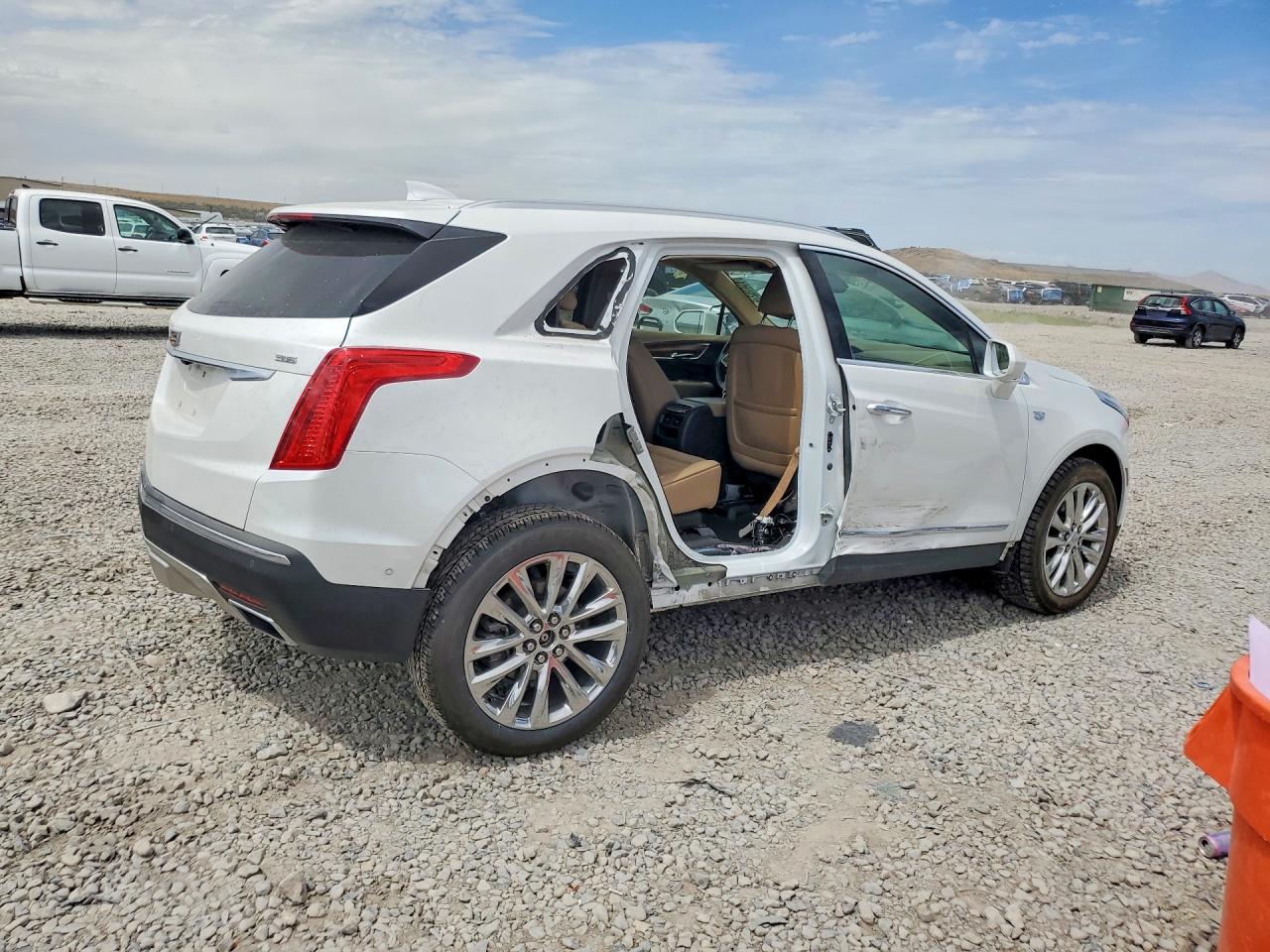 1GYKNGRS2KZ115571 · 2019 CADILLAC XT5 · 3/13