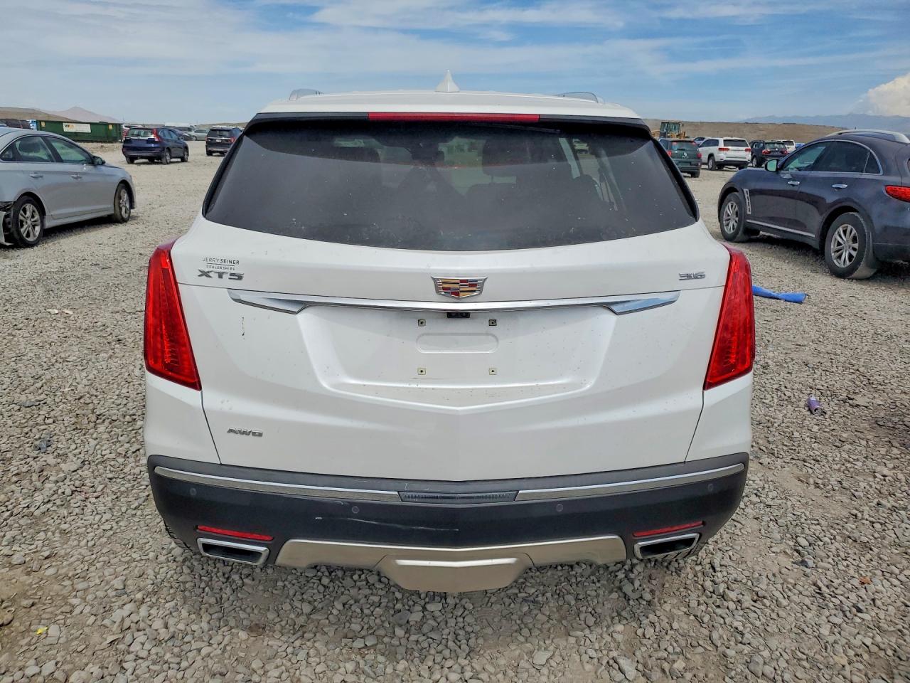 1GYKNGRS2KZ115571 · 2019 CADILLAC XT5 · 6/13