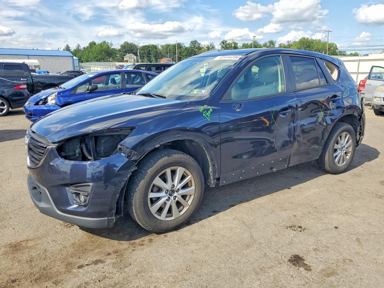 JM3KE4CY3G0797963 · 2016 MAZDA CX-5