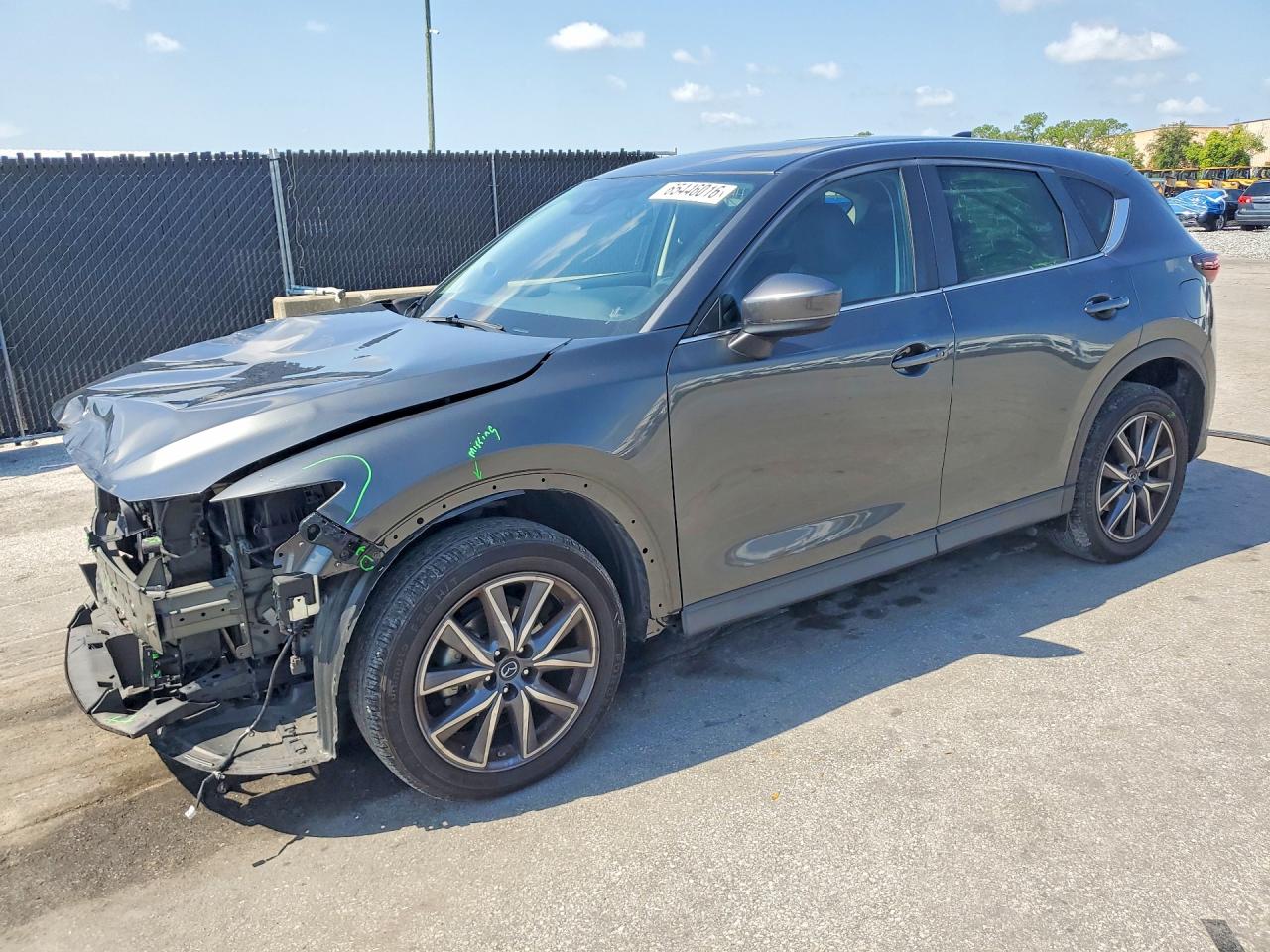 JM3KFACM6J1402958 · 2018 MAZDA CX-5