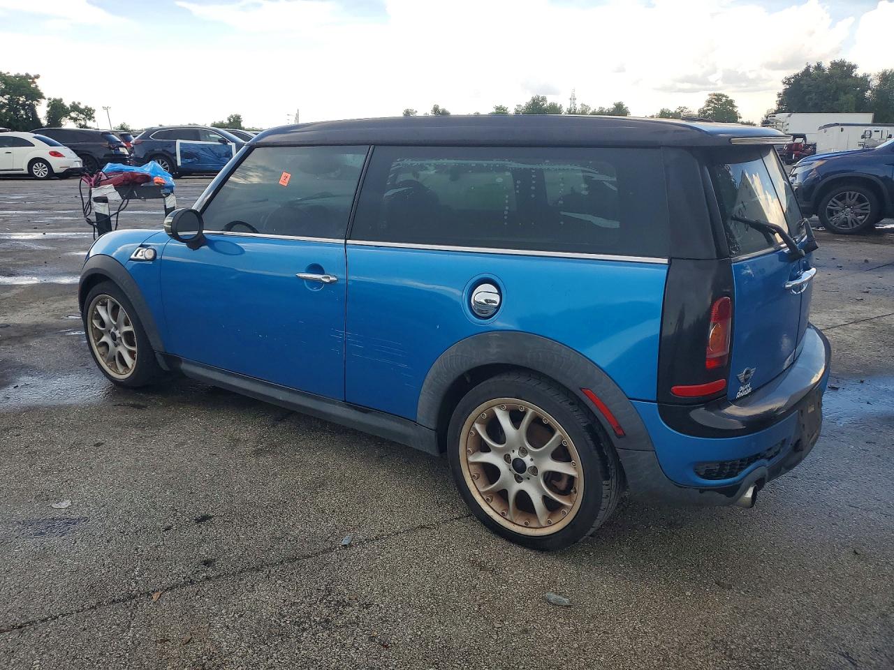 WMWMM33509TP73199 · 2009 MINI COOPER · 2/13
