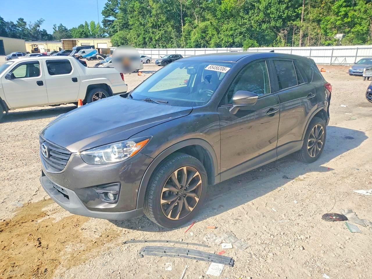 JM3KE2DY2G0814187 · 2016 MAZDA CX-5