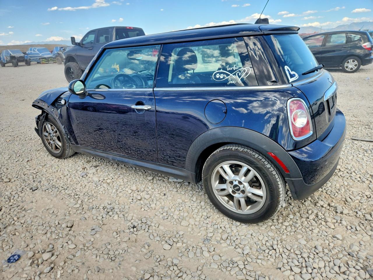 WMWSU3C5XCT543748 · 2012 MINI COOPER · 2/13