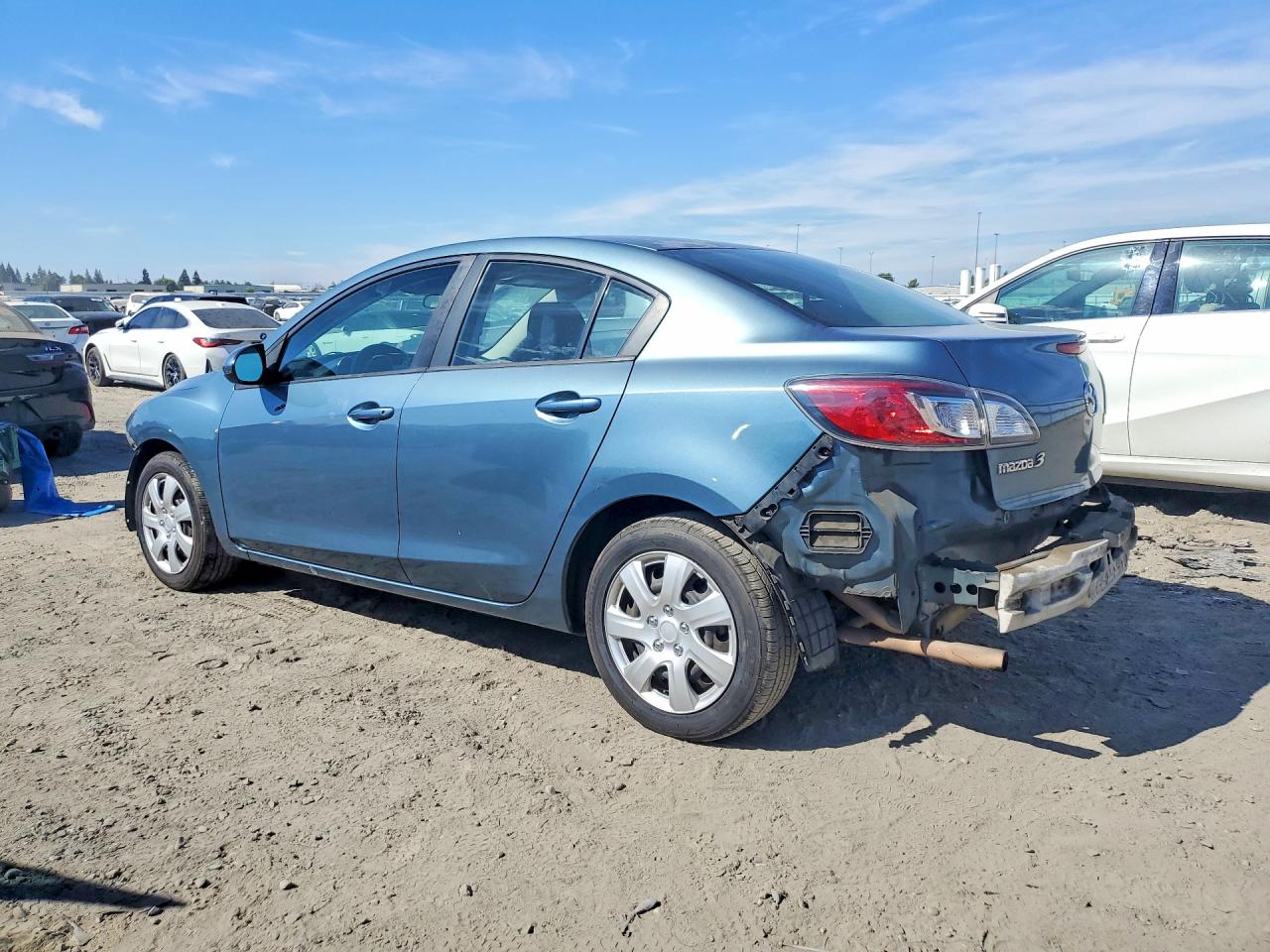 JM1BL1UG7B1459858 · 2011 MAZDA 3 · 2/13