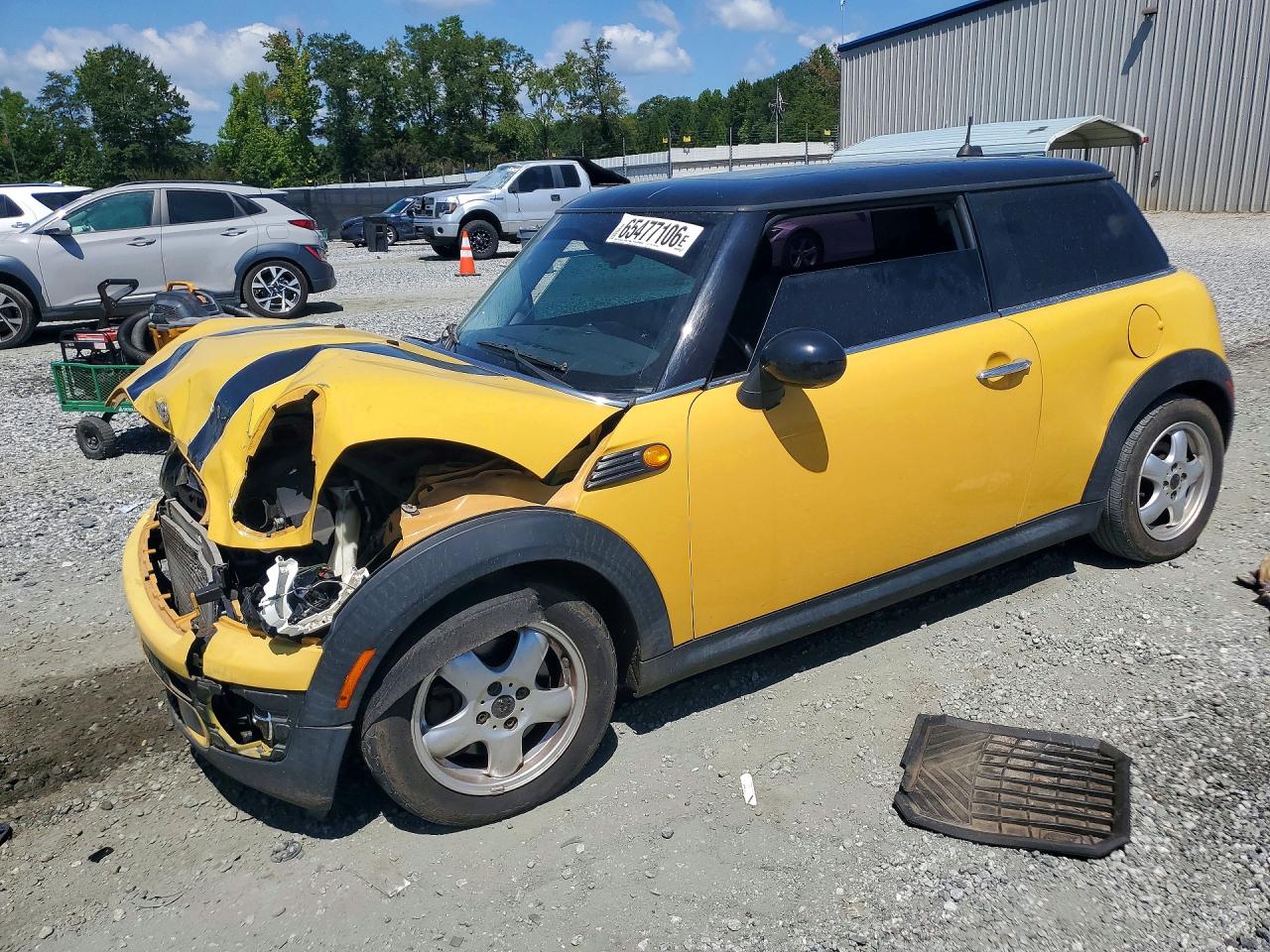 WMWMF335X9TU71557 · 2009 MINI COOPER