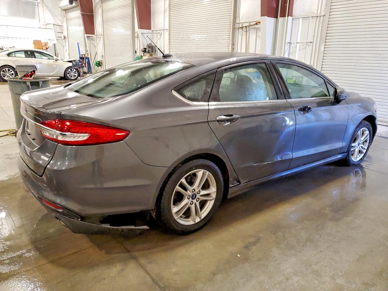 3FA6P0HD2JR158697 · 2018 FORD FUSION · 3/12
