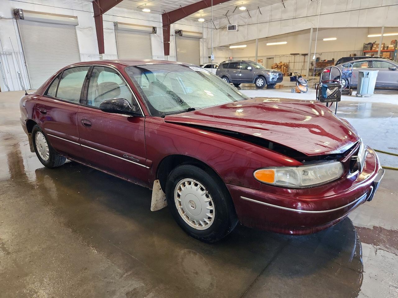 2G4WS52MXX1420747 · 1999 BUICK CENTURY · 4/12