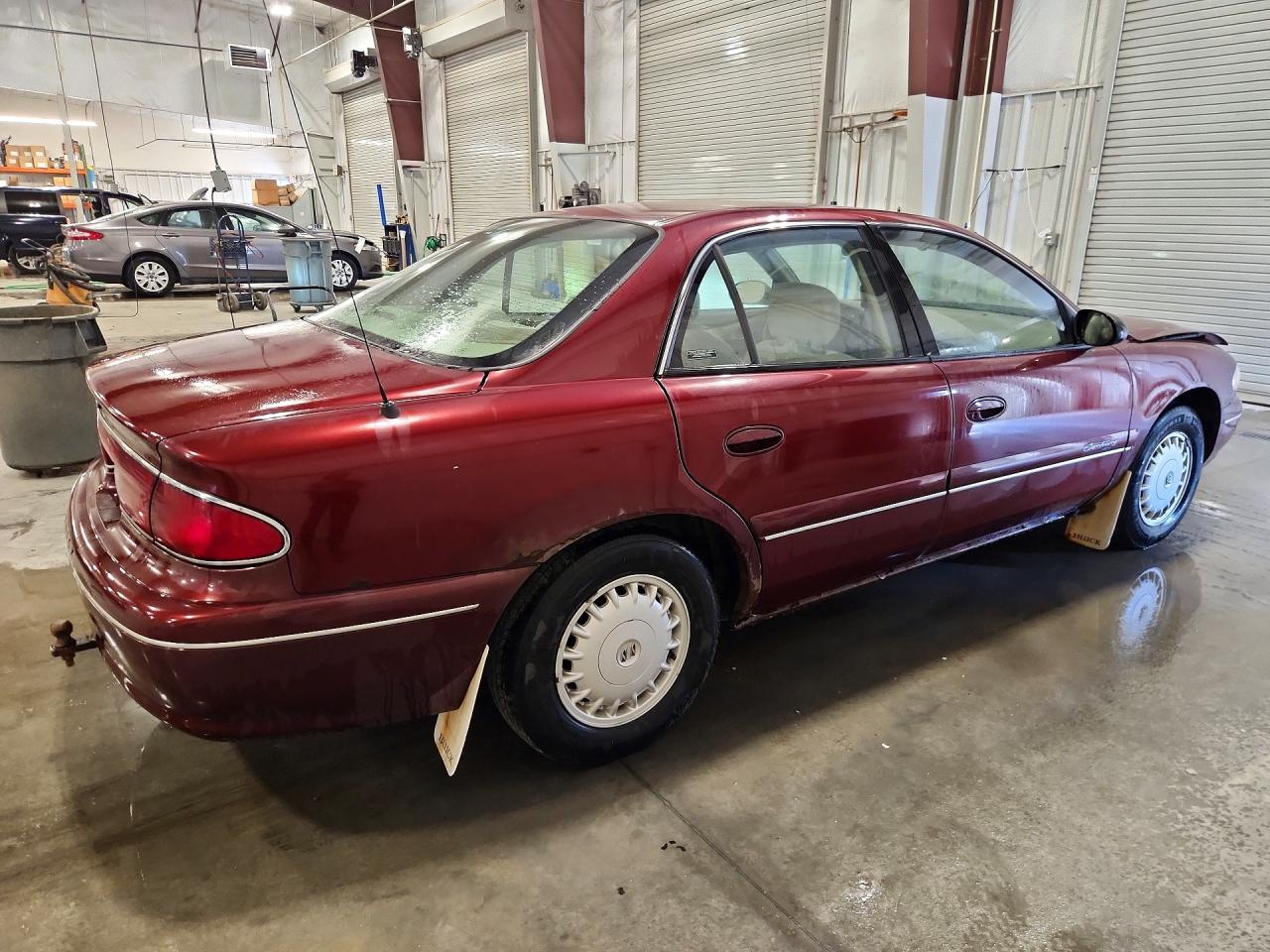 2G4WS52MXX1420747 · 1999 BUICK CENTURY · 3/12