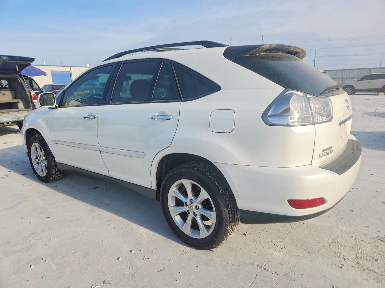 2T2GK31U49C074600 · 2009 LEXUS RX · 2/13