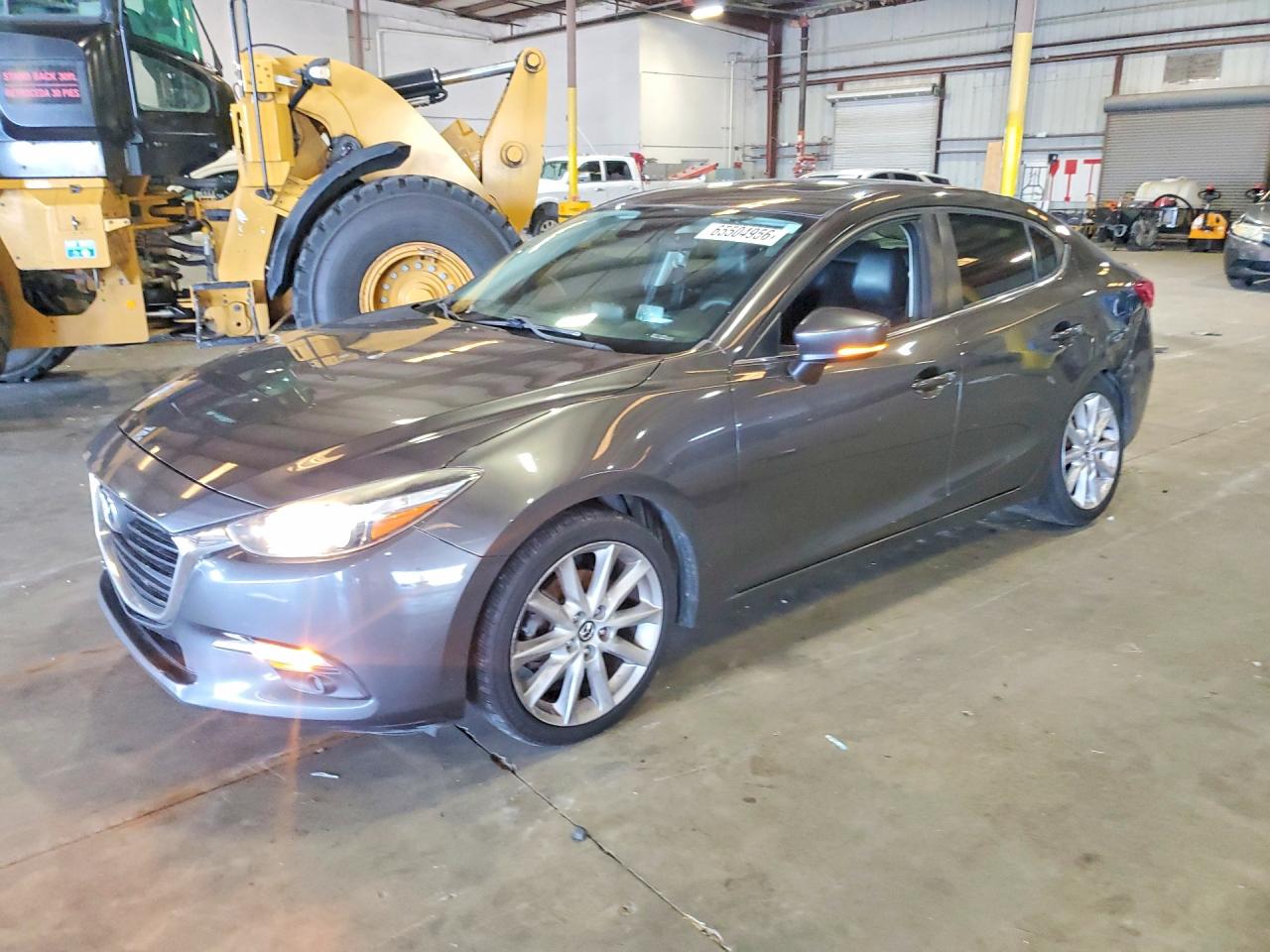 JM1BN1W35H1115393 · 2017 MAZDA 3