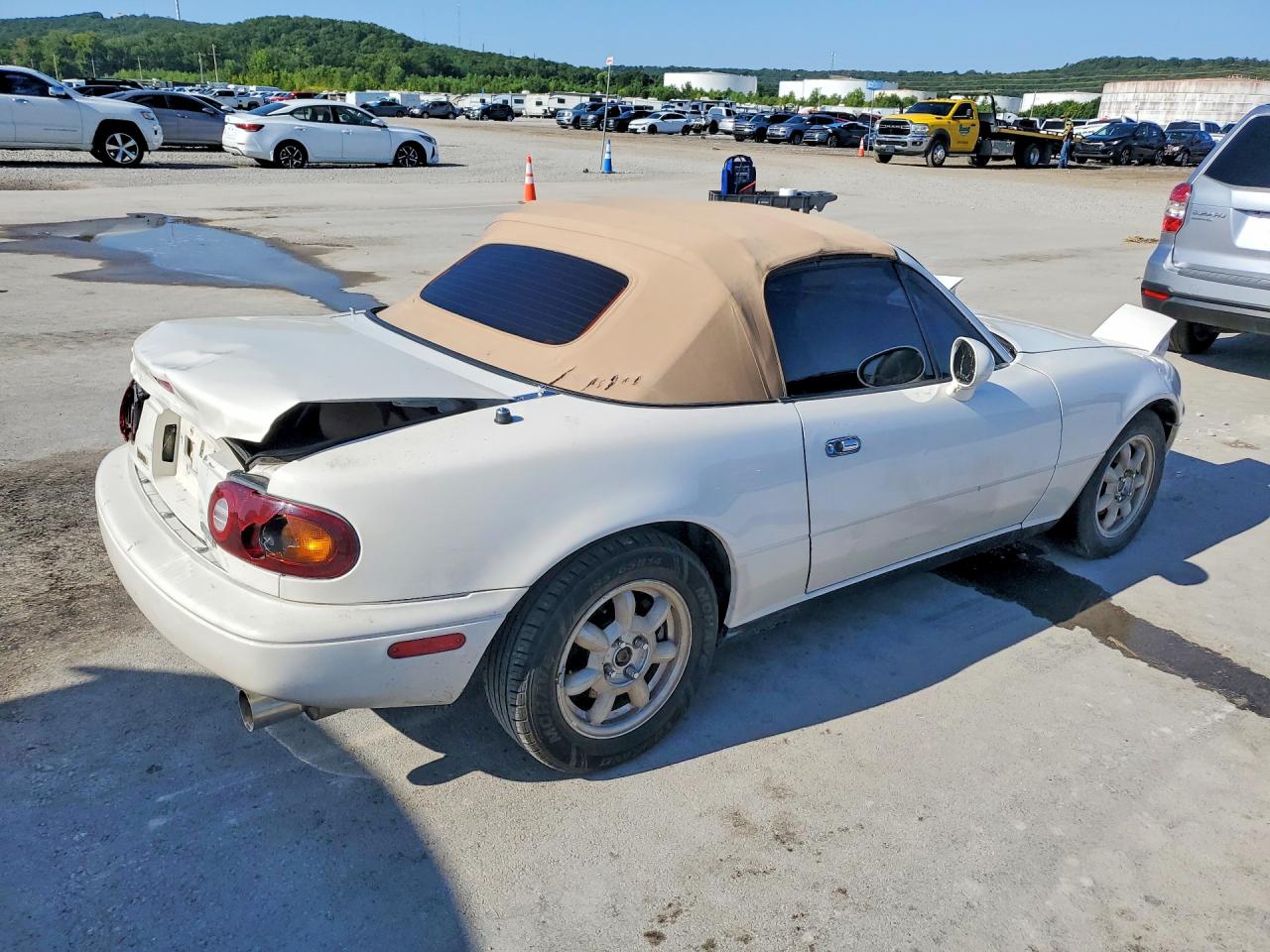 JM1NA3531T0707345 · 1996 MAZDA MX-5 MIATA · 3/12