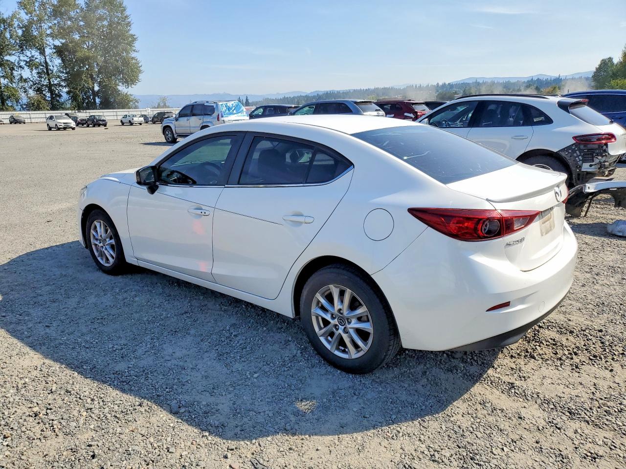 3MZBM1V7XFM139001 · 2015 MAZDA 3 · 2/12