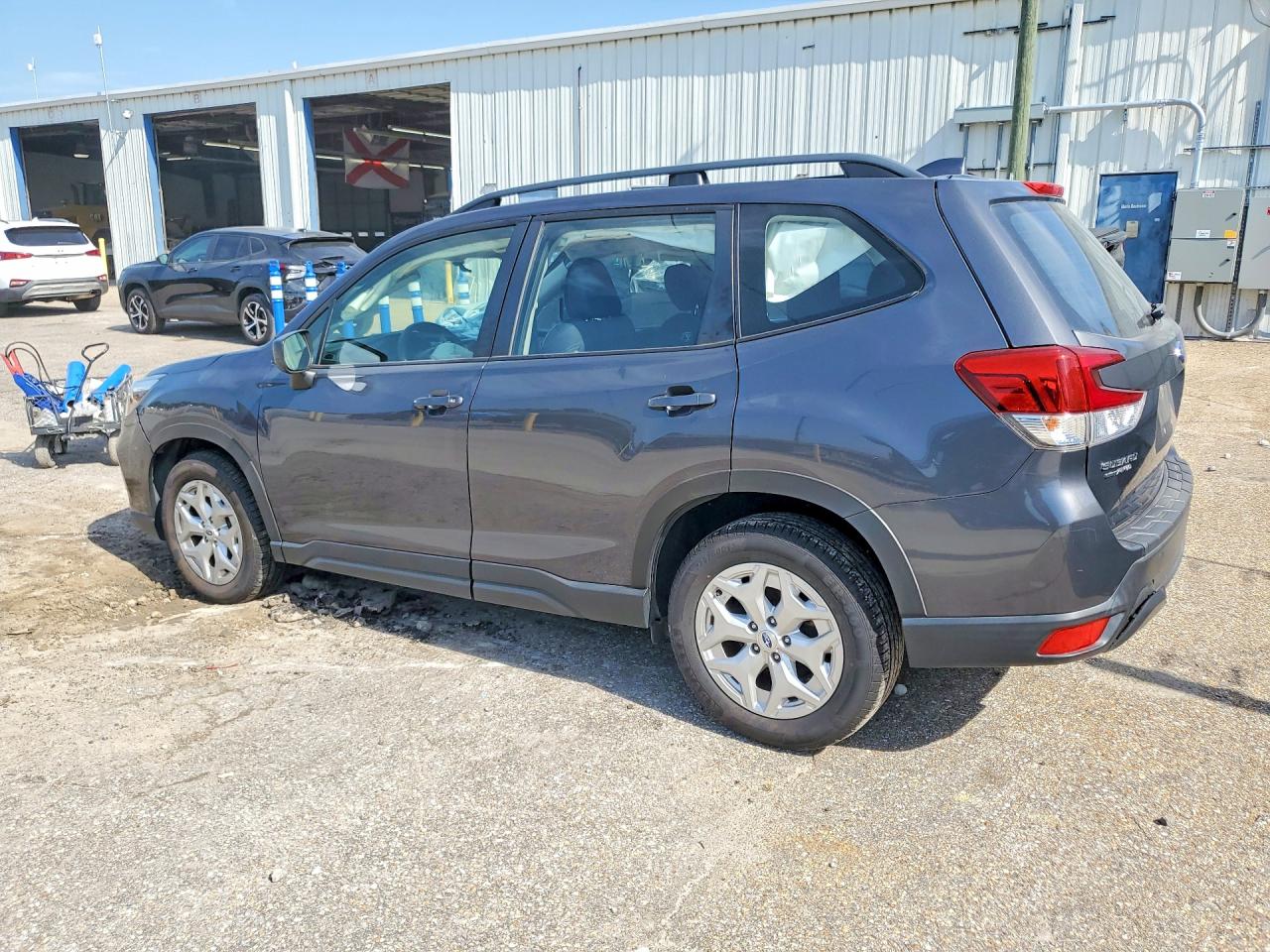 JF2SKADC8MH520064 · 2021 SUBARU FORESTER · 2/12