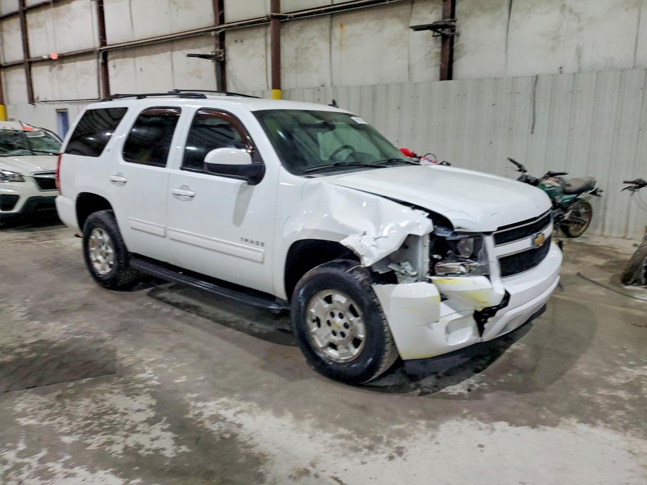 1GNSKBE09BR107593 · 2011 CHEVROLET TAHOE · 4/13