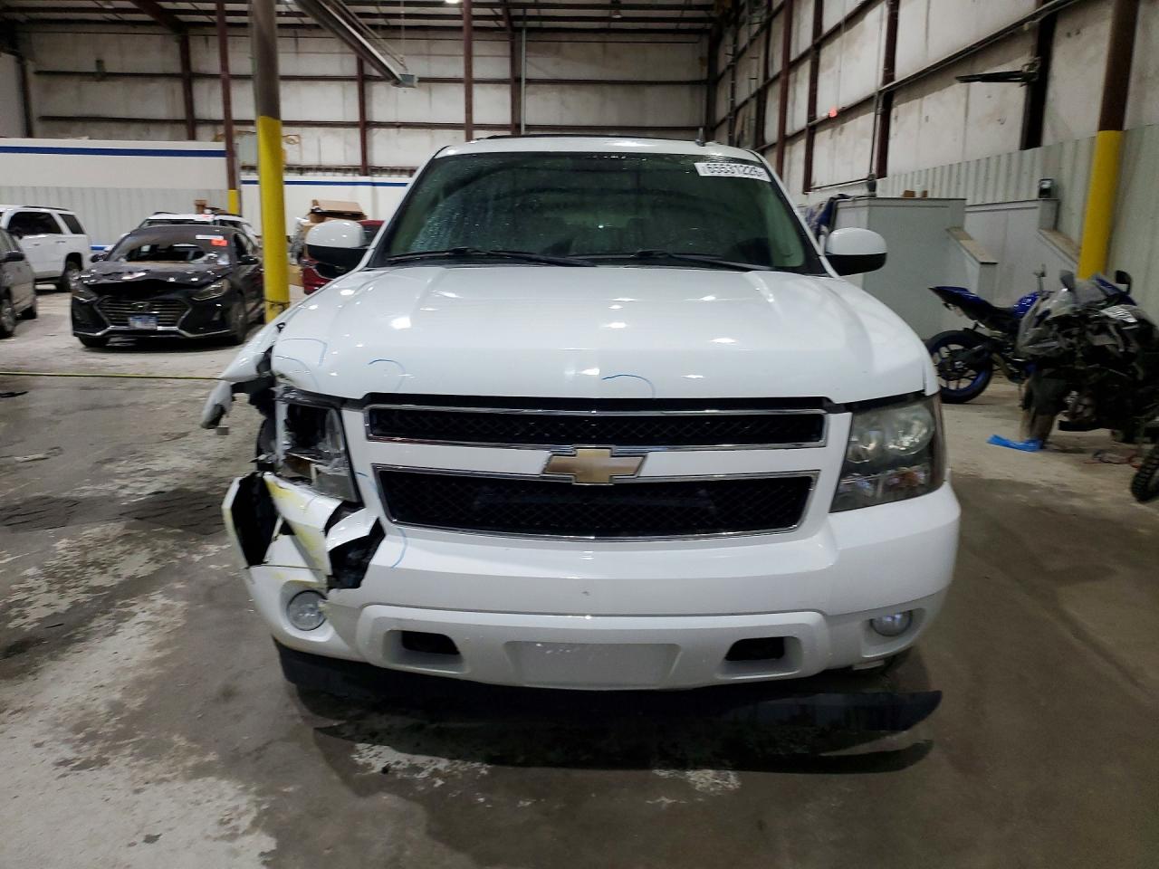 1GNSKBE09BR107593 · 2011 CHEVROLET TAHOE · 5/13