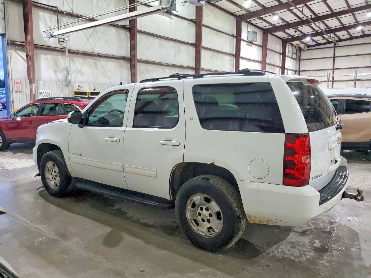 1GNSKBE09BR107593 · 2011 CHEVROLET TAHOE · 2/13