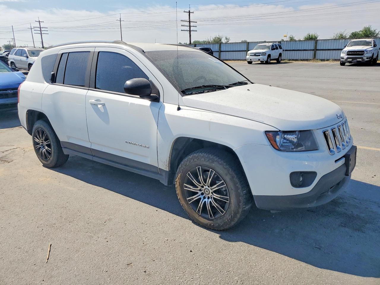 1C4NJCBA4ED777100 · 2014 JEEP COMPASS · 4/13