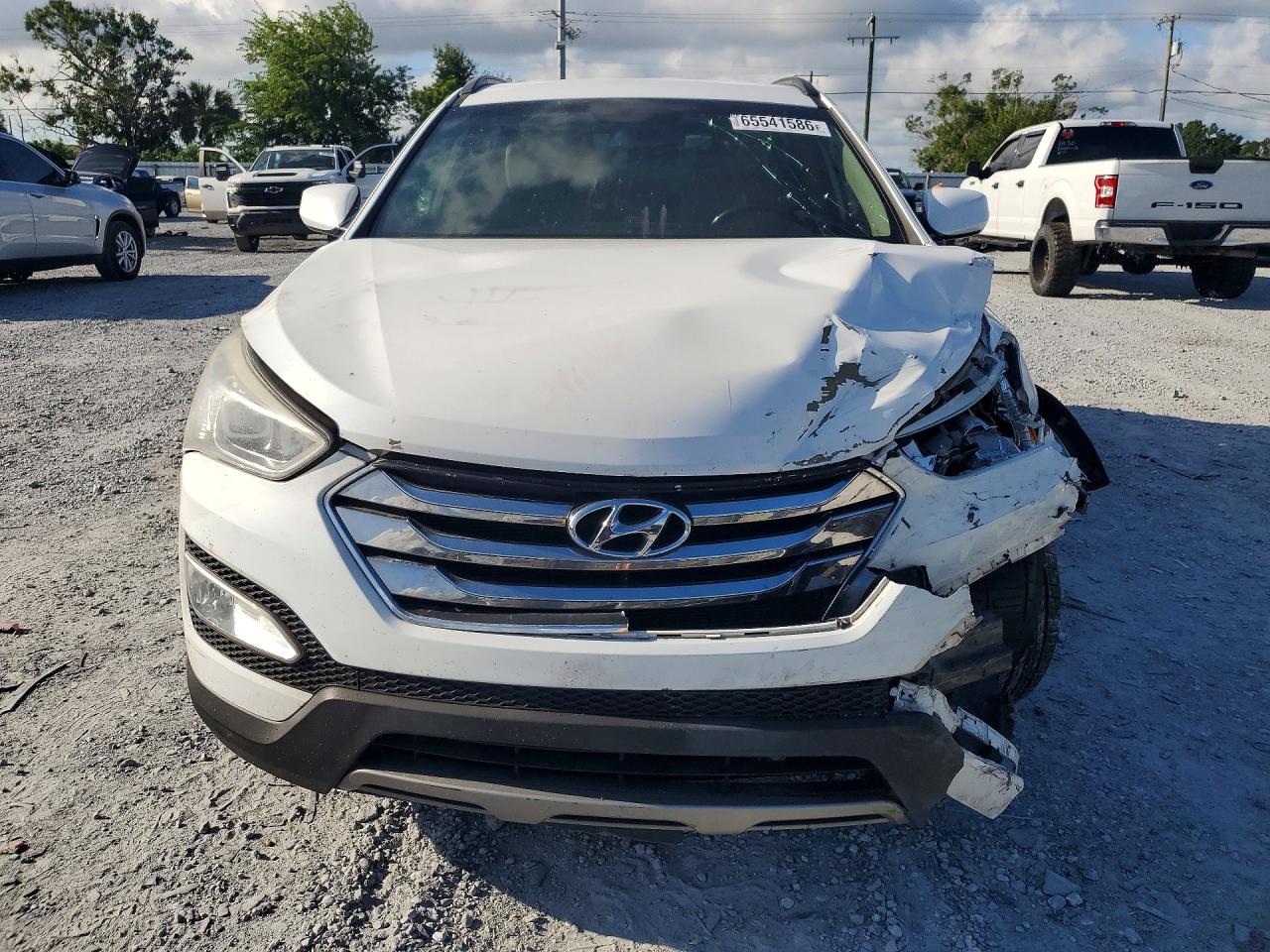 5XYZU3LB7EG200031 · 2014 HYUNDAI SANTA FE SPORT · 5/13
