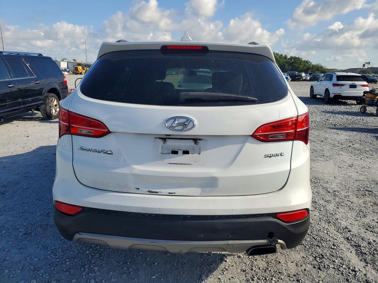 5XYZU3LB7EG200031 · 2014 HYUNDAI SANTA FE SPORT · 6/13