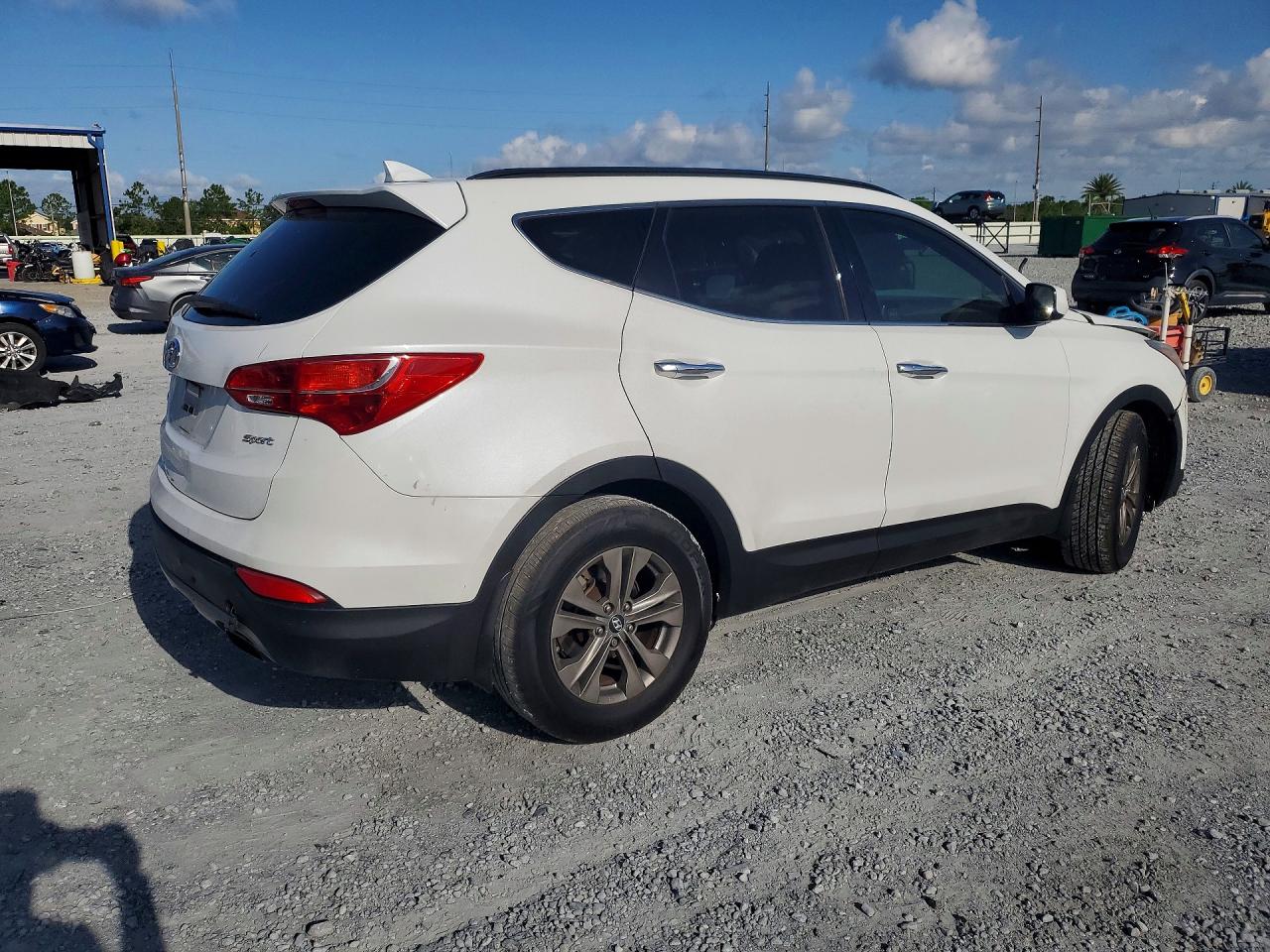 5XYZU3LB7EG200031 · 2014 HYUNDAI SANTA FE SPORT · 3/13