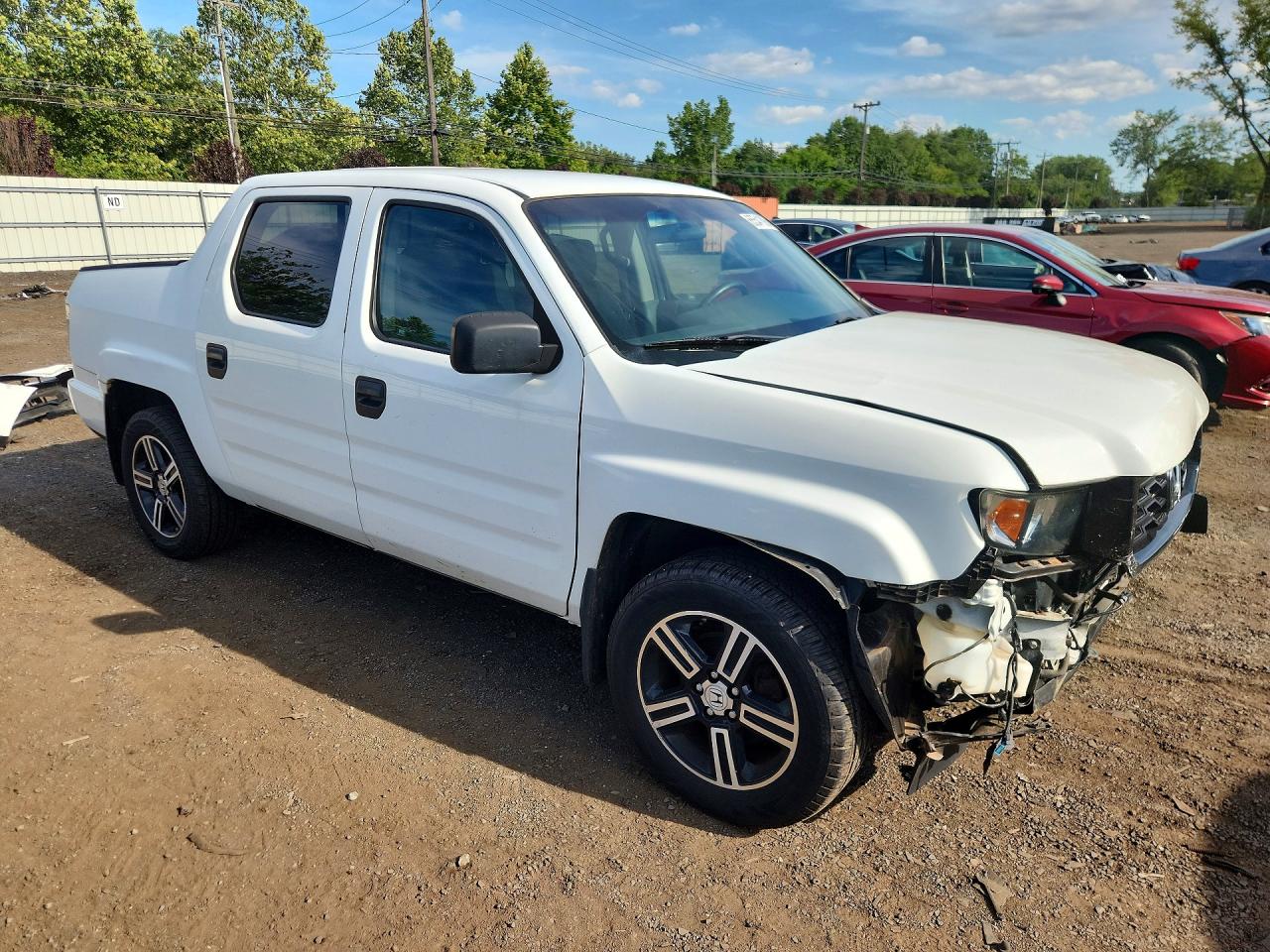 5FPYK1F75CB454037 · 2012 HONDA RIDGELINE · 4/13