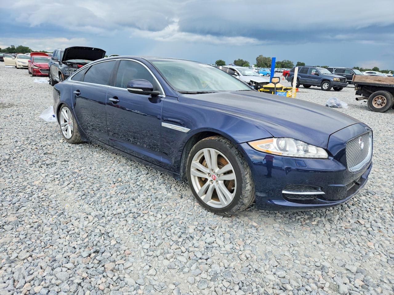SAJWA2GZ7E8V63385 · 2014 JAGUAR XJL · 4/12