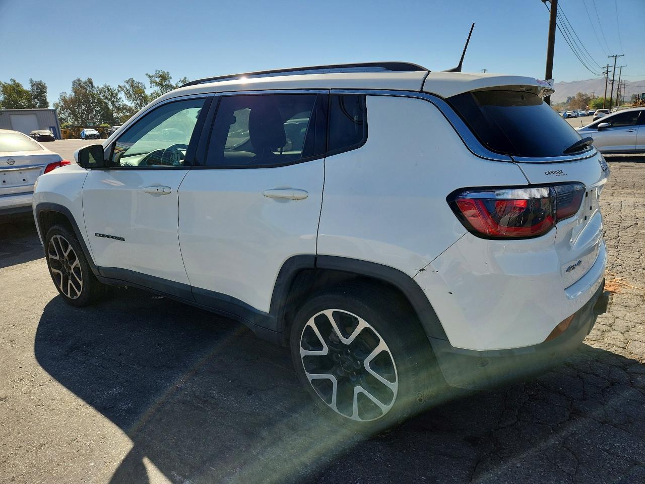 3C4NJDCB9HT631836 · 2017 JEEP COMPASS · 2/13