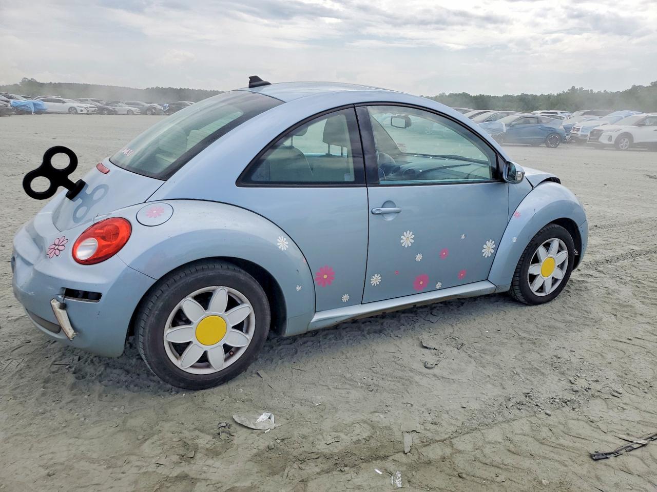 3VWRW3AG7AM028621 · 2010 VOLKSWAGEN NEW BEETLE · 3/12