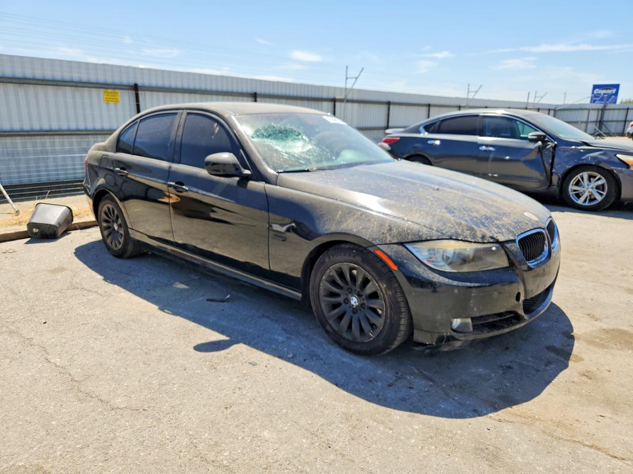 WBAPH57559NL77684 · 2009 BMW 328 · 4/12