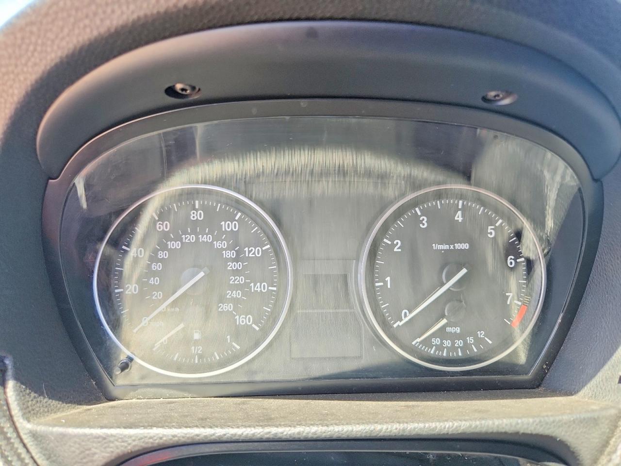 WBAPH57559NL77684 · 2009 BMW 328 · 9/12