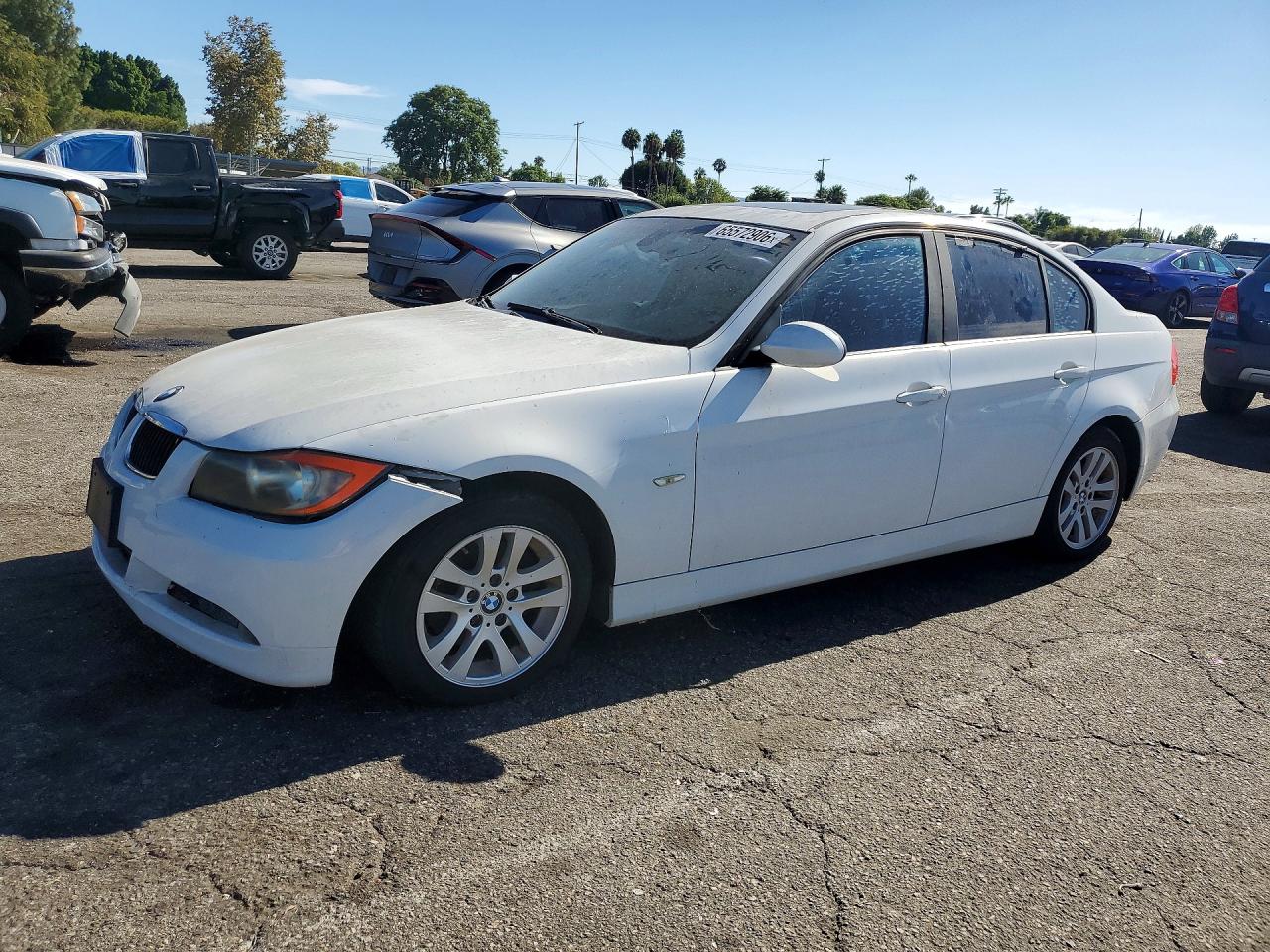 WBAVC53547FZ77034 · 2007 BMW 328