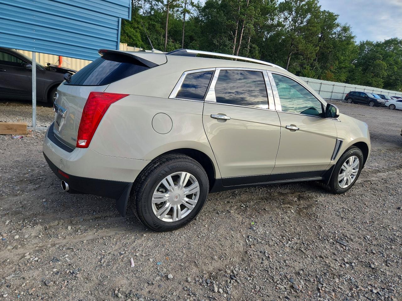 3GYFNBE31ES658995 · 2014 CADILLAC SRX · 3/13