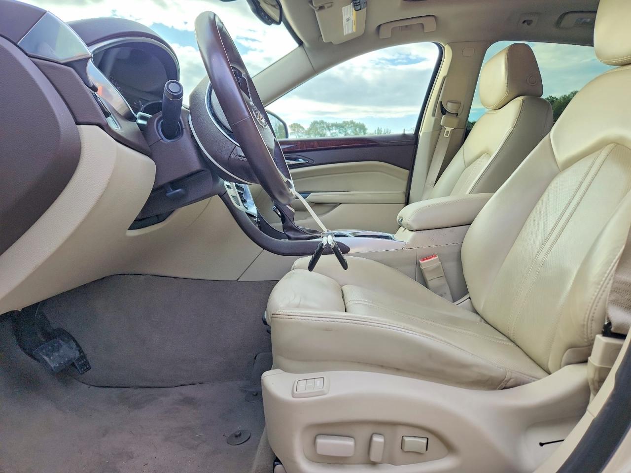 3GYFNBE31ES658995 · 2014 CADILLAC SRX · 7/13