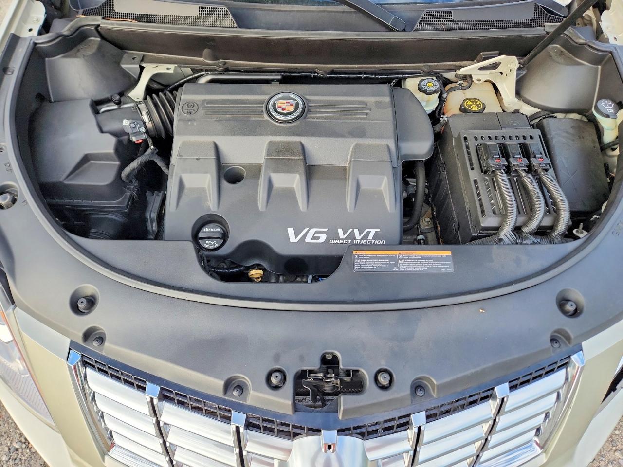3GYFNBE31ES658995 · 2014 CADILLAC SRX · 12/13