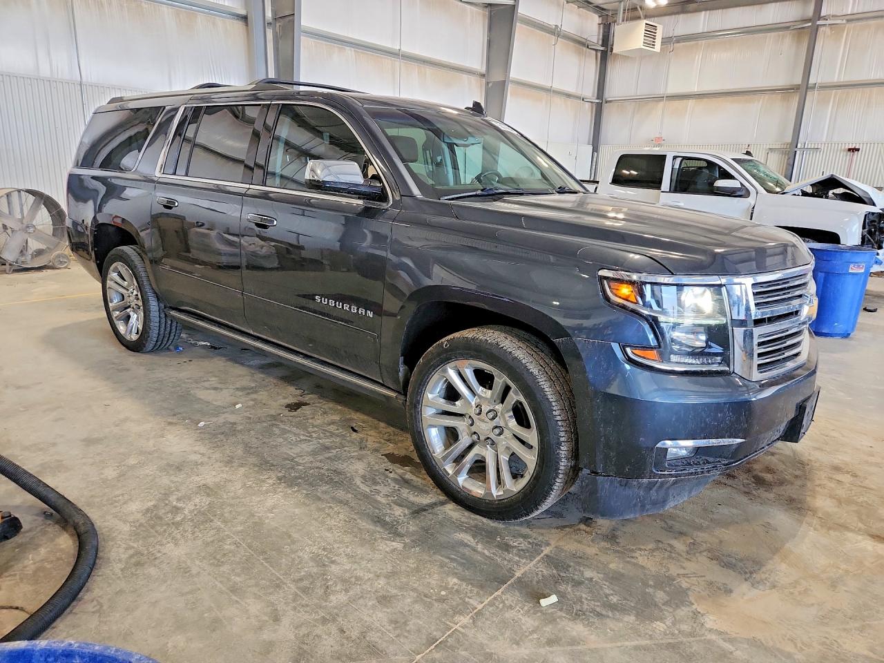 1GNSKJKJ9LR219996 · 2020 CHEVROLET SUBURBAN · 4/13
