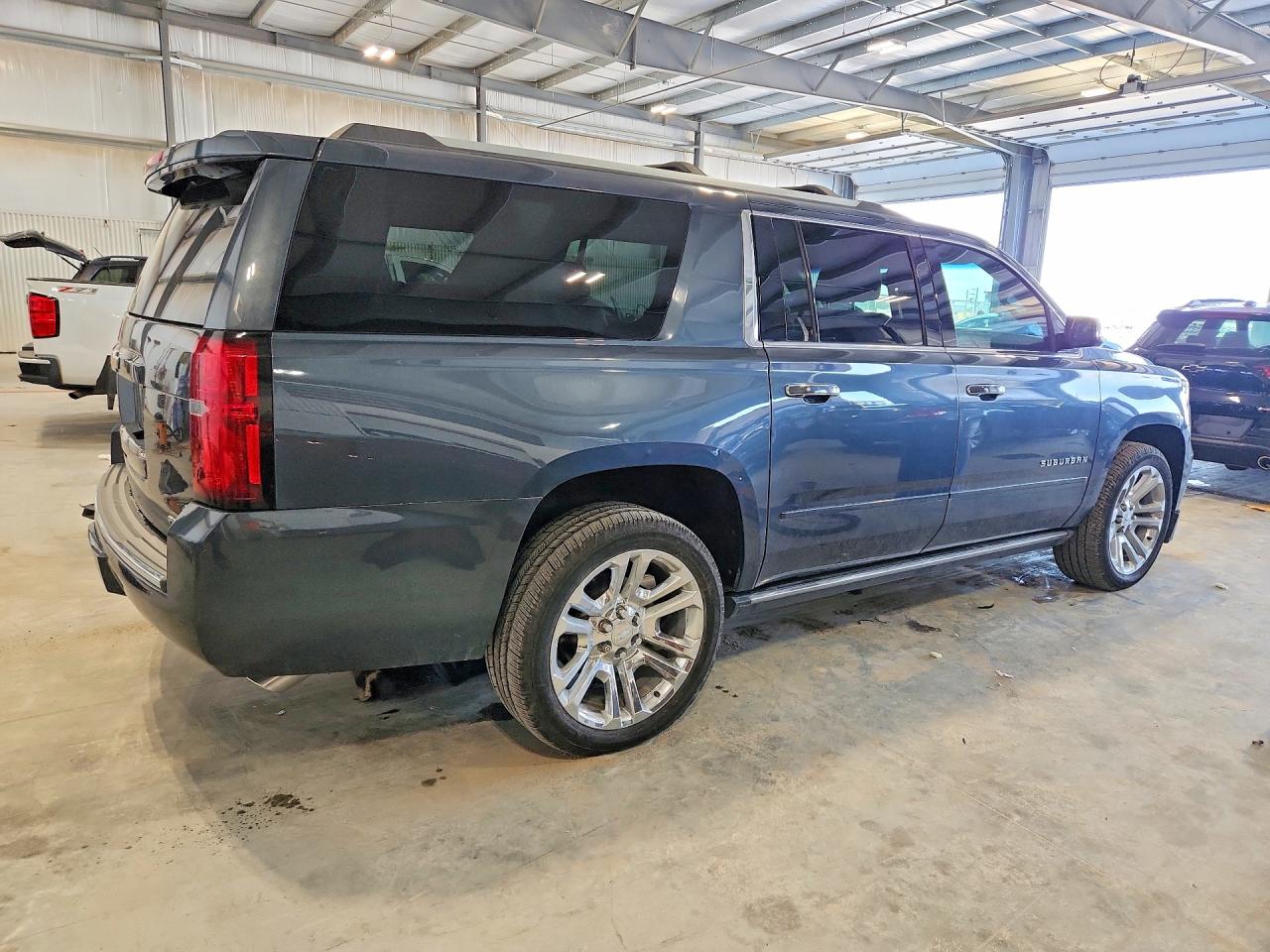 1GNSKJKJ9LR219996 · 2020 CHEVROLET SUBURBAN · 3/13
